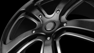 singapore rims, Close-up image of a black metal car singapore rims